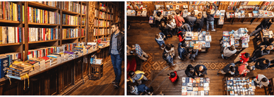 Homem diante das estantes e multidão às mesas de livros