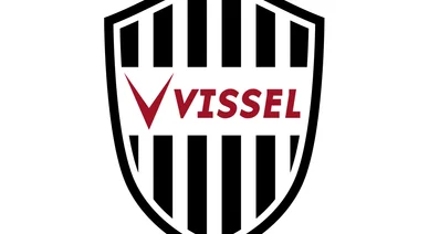 شعار كلاسيكي لنادي فيسيل كوبه الياباني بتصميم درع مقلم بالخطوط السوداء والبيضاء مع كلمة VISSEL وحرف V باللون الأحمر