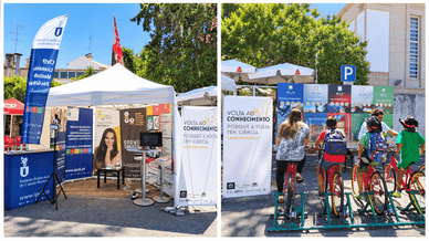 Stand do Instituto Politécnico de Castelo Branco e crianças em bicicletas estáticas numa atividade sobre energia