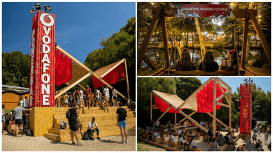 Estrutura Vodafone Powerbar e baloiços junto ao rio no recinto do festival