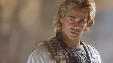 Colin Farrell as Alexander the Great wearing ancient Macedonian armor and costume in Oliver Stone's epic historical film.