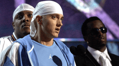 Емінем, Шон "Дідді" Комбс та Proof під час церемонії вручення нагород The Source Hip-Hop Music Awards