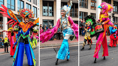Stelzenläufer in Vogelkostümen beim Freimarkt-Umzug in Bremen