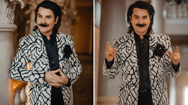 Український естрадний співак, народний артист України Павло Зібров у стильному чорно-білому піджаку із абстрактним візерунком