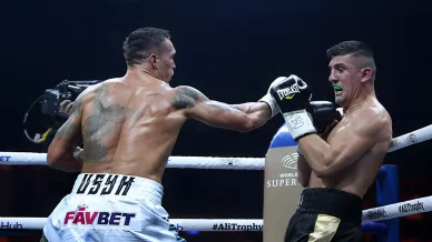 Oleksandr Usyk fighting against Marco Huck during their World Boxing Super Series bout in Berlin, September 2017