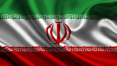 علم إيران (Iran Flag): علم الجمهورية الإسلامية الإيرانية متموج بألوانه الثلاثة والشعار الوطني.