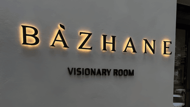 Вивіска BAZHANE Visionary Room — нової концептуальної локації українського преміального бренду одягу BAZHANE