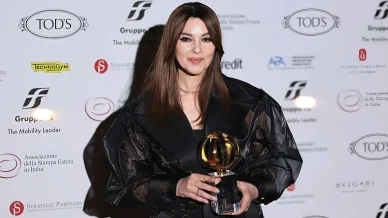 Monica Belllucci con il Globo d'Oro alla carriera Monica Bellucci Premi