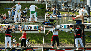 Zwei Männer beim traditionellen Fischerstechen mit Stechstangen auf Booten im Wormser Floßhafen