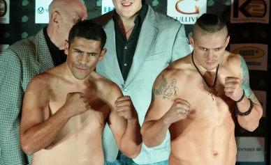 Oleksandr Usyk and Felipe Romero face off at the weigh-in ceremony in Kyiv, November 2013