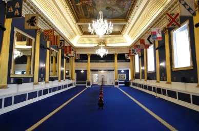 St Patrick's Hall at Dublin Castle, featuring the grand ceremonial room with its ornate painted ceiling and elegant Georgian architecture.