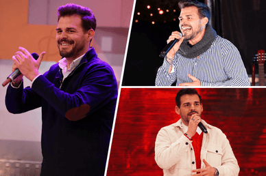 Ruben Aguiar a cantar com microfone em palco
