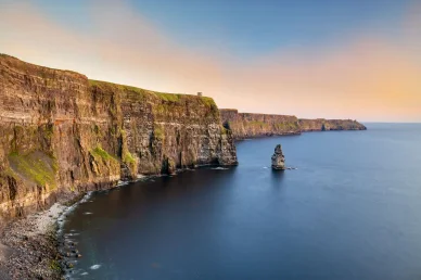Coastal landscape of Ireland with the sea and green hills