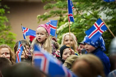People celebrate Iceland's Independence Day, 17 June Icelanders with flags