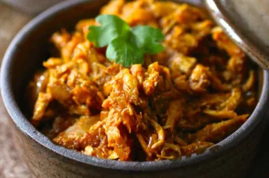 Блюдо Ньембуэ чикен (Nyembwe Chicken)