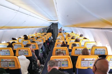 Ryanair aircraft cabin interior with passengers.