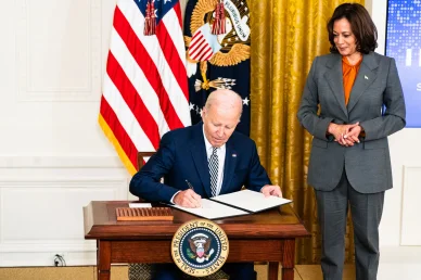 U.S. President Joe Biden signs an executive order on artificial intelligence regulations in Washington, D.C., on October 30