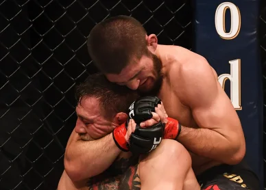 Khabib Nurmagomedov choking Conor McGregor to a submission win in UFC fight