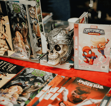 Прилавок із коміксами на українському фестивалі Comic Con Прилавок із коміксами на фестивалі Comic Con