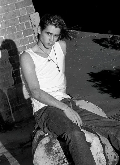 Colin Farrell in 1995 as a young actor, wearing casual 1990s clothing and looking slightly off camera.